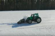 Установлен рекорд по уборке снега на беспилотном тракторе